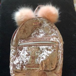 Justice mini backpack with an ‘I’